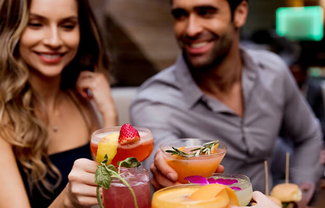 woman and man cheers alcohol